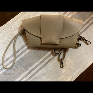 NWOT Anthropologie clutch w/optional strap, 2 zippered pockets, and card holder